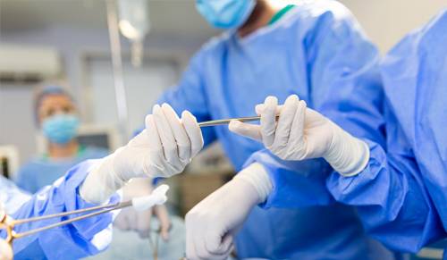 Traitement des hernies par implant de renfort pariétal