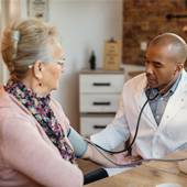20260622_Ambrisentan_Black-Doctor-Measuring-Senior-Woman's-Blood-Pressure-During-Home-Visit_Magnific
